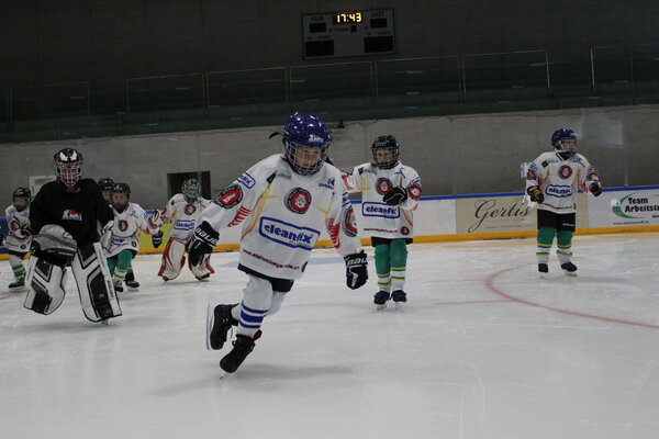 Eislauf-Hockey-Schule